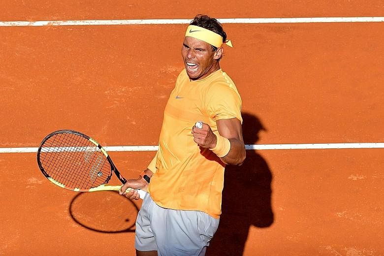 Rafael Nadal celebrating after winning his semi-final against Novak Djokovic at Rome's Italian Open. Nadal is in today's final for a record 10th time.