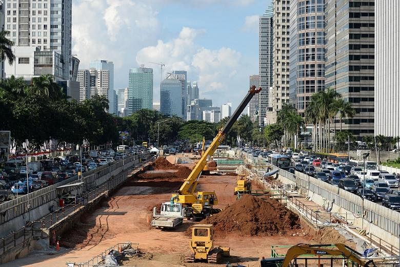 A mass rapid transit construction site in Jakarta. Indonesia, the largest and most populous Asean member state, is one of the 10 members of the regional grouping. By 2030, Asean will form the world's fourth-largest economy - and with more than 60 per