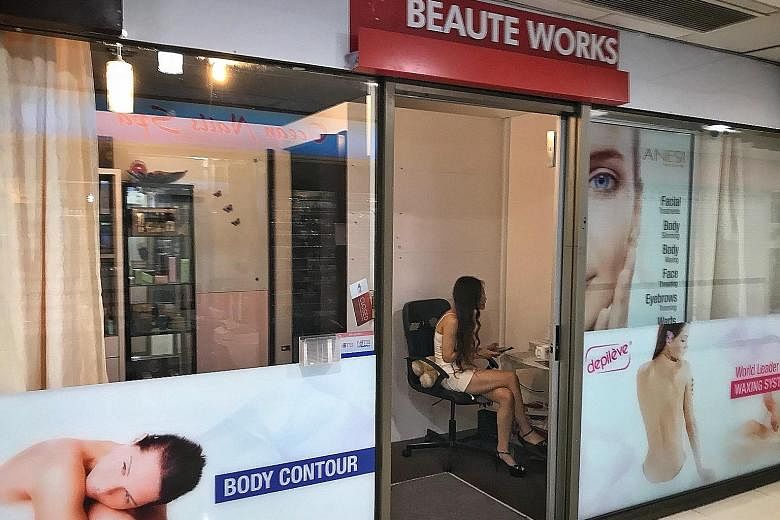 Far East Plaza has seen a shift in services, with massage parlours springing up mostly on the fourth and fifth floors of the mall that used to draw youngsters with its apparel and accessory shops.