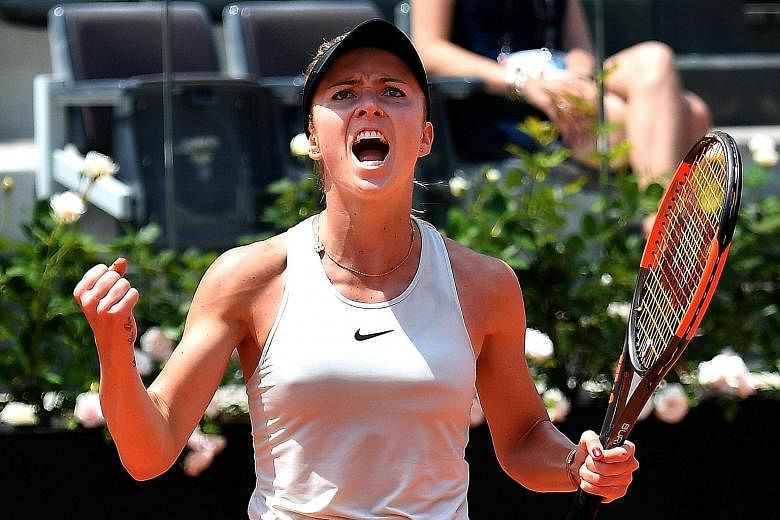 Ukraine's Elina Svitolina pumps her fist in delight as she outclasses world No. 1 Simona Halep in the Italian Open final yesterday. The world No. 4 has has emerged victorious in her last eight final appearances.