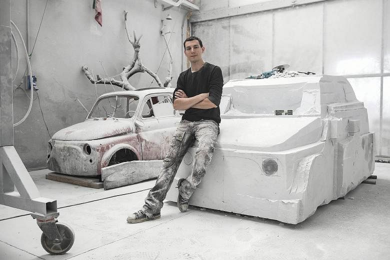Italian artist sculpts a Fiat 500 car out of marble