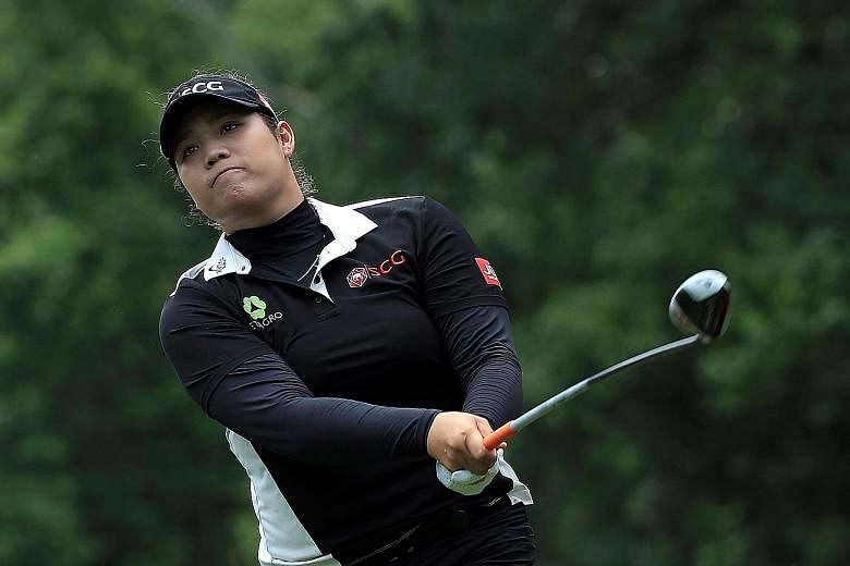 Ariya Jutanugarn of Thailand hits her tee shot on the fourth hole during the third and final round of the Kingsmill Championship on Sunday. She birdied the second play-off hole to beat Japan's Nasa Hataoka and clinch the title.
