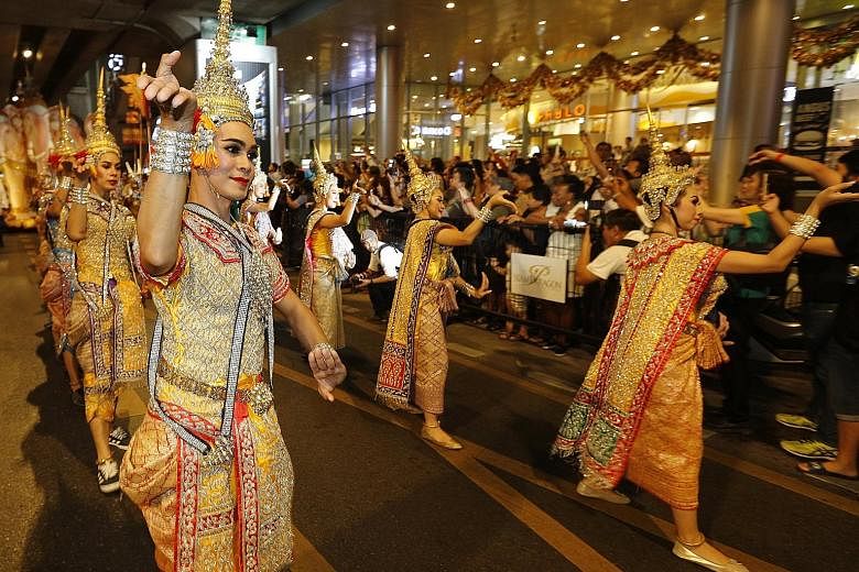 Thai dancers performing during the opening ceremony of the Amazing Thailand Tourism Year 2018 parade in Bangkok last November. In the January-March quarter, tourist numbers surged 15.4 per cent, private consumption was up 3.6 per cent, and private in