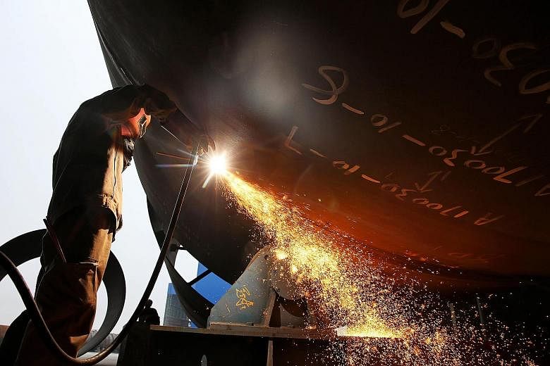 A worker welding steel at a shipyard in Nantong in China's eastern Jiangsu province. In March, US President Donald Trump announced plans to impose tariffs on Chinese imports - mainly steel and aluminium. Now, Washington and Beijing have agreed to sto
