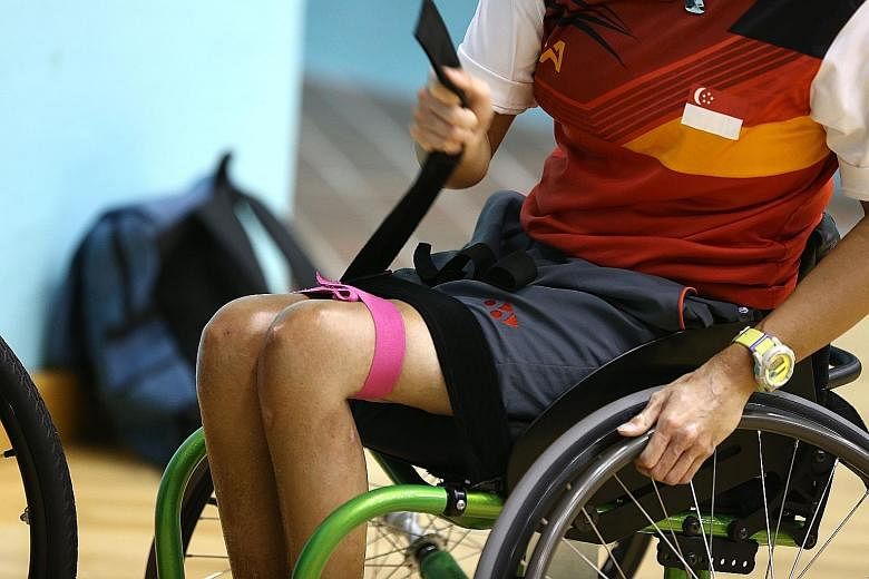 Ms Yap gearing up for training in wheelchair badminton, a sport that she picked up about two years ago.