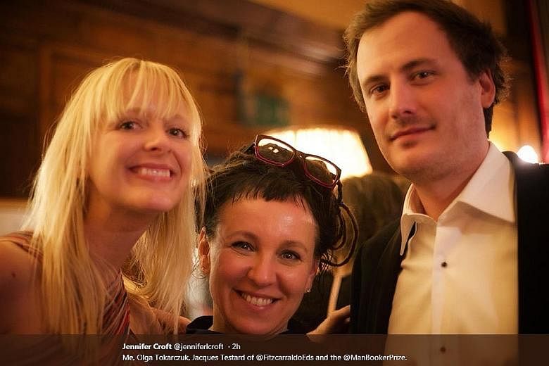 Writer Olga Tokarczuk (left) shares the $67,000 prize money with translator Jennifer Croft (far left) for their work together on Flights.