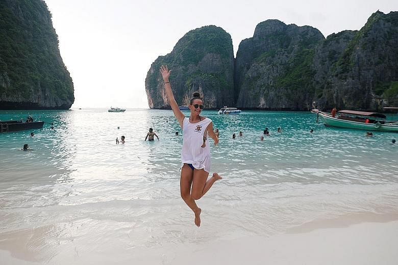 According to Thailand's tourism agency, up to 5,000 visitors go to Phi Phi Leh island every day, travelling by speedboat and ferries to Maya Bay, which is sheltered by 100m-high cliffs and boasts soft white-sand beaches.