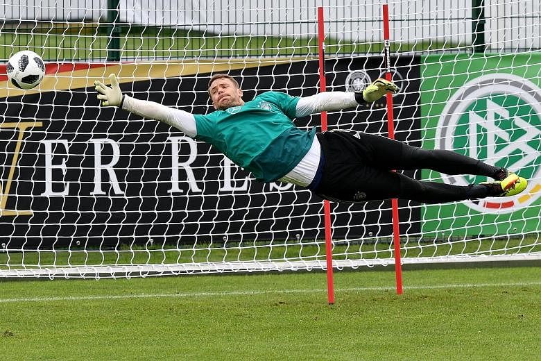 Germany goalkeeper Manuel Neuer participating in a training session in Eppan, Italy, yesterday. The 32-year-old captain has not played since breaking a bone in his foot in September but is now recovering after surgery.