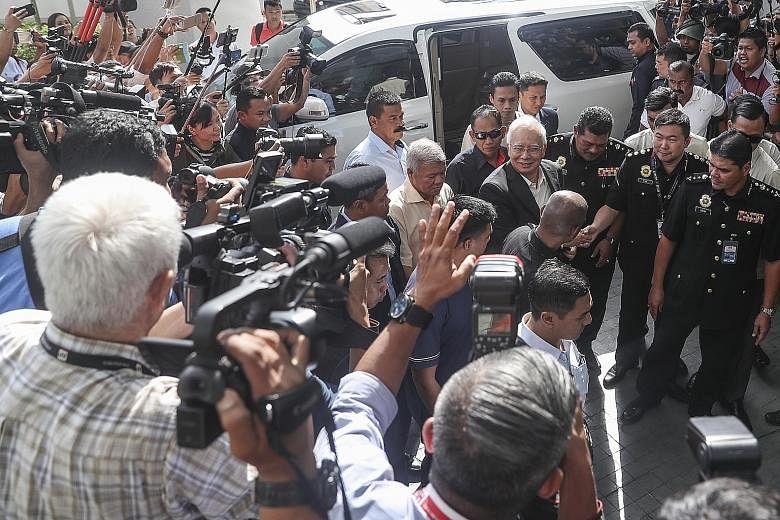 Former Malaysian prime minister Najib Razak arriving at the anti-graft agency's headquarters yesterday morning. He later told reporters that his session started at 10am and ended at 4.30pm, with 40 minutes for him to rest and pray.