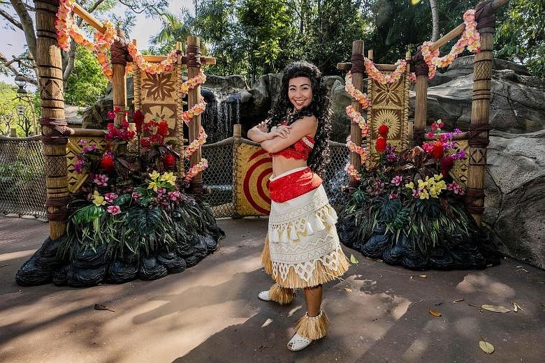 Meet Moana (above) and watch the buildings of Main Street, USA  (left) transform into a canvas for visuals paying tribute to Mickey Mouse at Hong Kong Disneyland Resort.