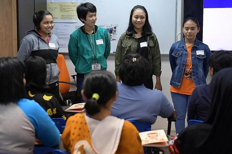 A new maid having her thumb print taken during registration for her work permit at the MOM Services Centre last Tuesday. As of last year, Singapore has 240,000 maids. New maids attending a Settling-In Programme. Last year, the Manpower Ministry punis