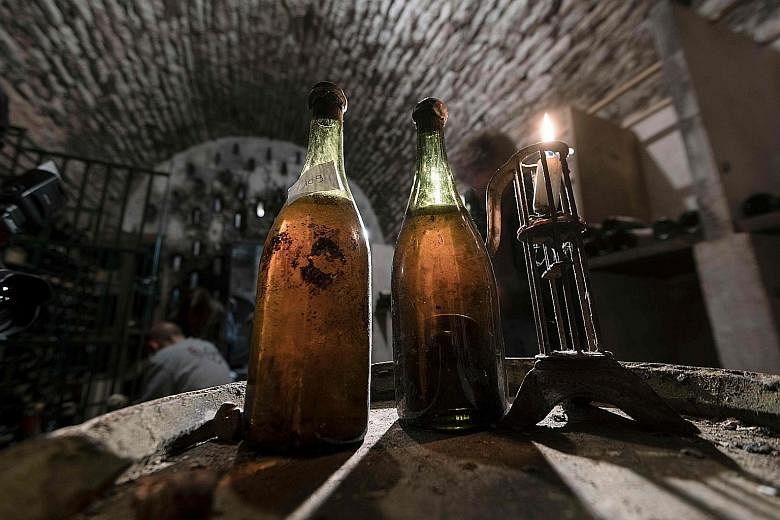 A bottle of Jura wine dating back to 1774 has sold for a record €103,700 (S$162,200) at auction in France, while two others of the same vintage also touched new highs. "I didn't think that these bottles would sell for so much. The last record set i