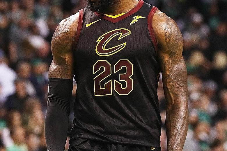 Cleveland's LeBron James reacting after a basket during Game 7 of the Eastern Conference Finals at Boston's TD Garden. He stood out with 35 points, 15 rebounds and nine assists.