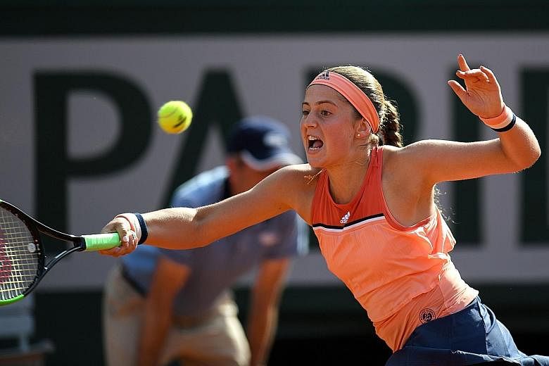 Latvia's Jelena Ostapenko was beaten for the third time in as many meetings by Ukraine's Kateryna Kozlova. That meant she was the first French Open women's title holder in 13 years to lose in the opening round.