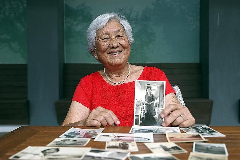 Madam Lye wore a special kebaya with gold details when the crew served the Sultan of Brunei on a flight in 1964. Madam Susan Lye holding a photo of her days as an air stewardess with the former Malayan Airways, which was later rebranded as Malaysia-S
