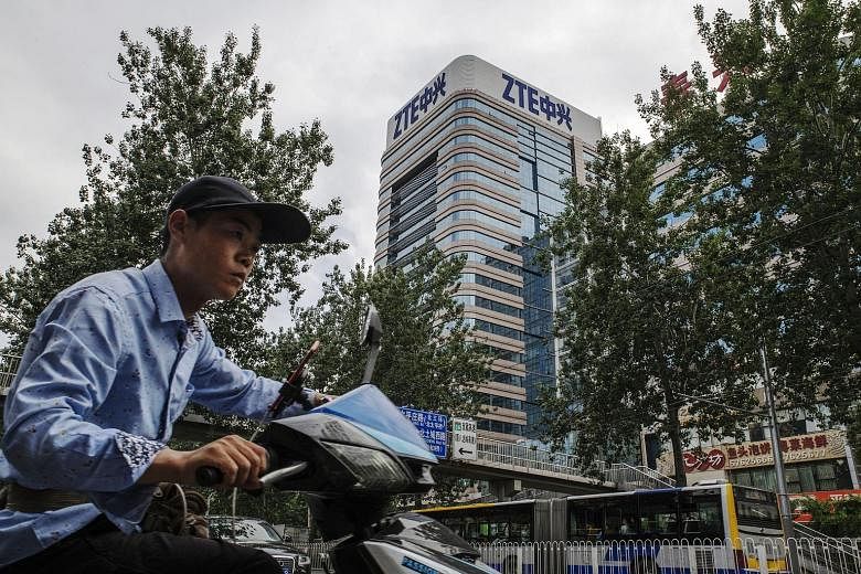 A ZTE building in Beijing. President Donald Trump said he was allowing the Chinese telecom firm to "reopen" in return for management changes, payment of a US$1.3 billion fine and a promise to buy American parts. Ms Ivanka Trump's growing portfolio 