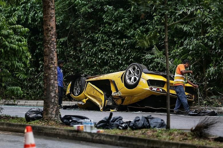 The overturned Lamborghini, with its front bonnet mangled, following the accident.