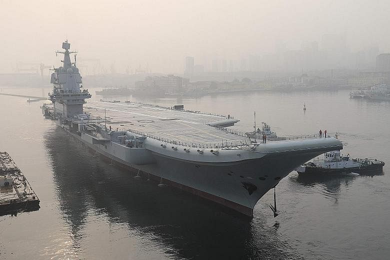 China's first domestically manufactured aircraft carrier, as yet unnamed, started sea trials last month.