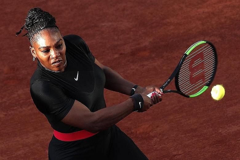 Serena Williams on her way to a hard-fought 3-6, 6-3, 6-4 second-round French Open victory against 17th seed Ashleigh Barty of Australia on Thursday. The American, who needs just one more Grand Slam singles title to equal Margaret Court's record tall