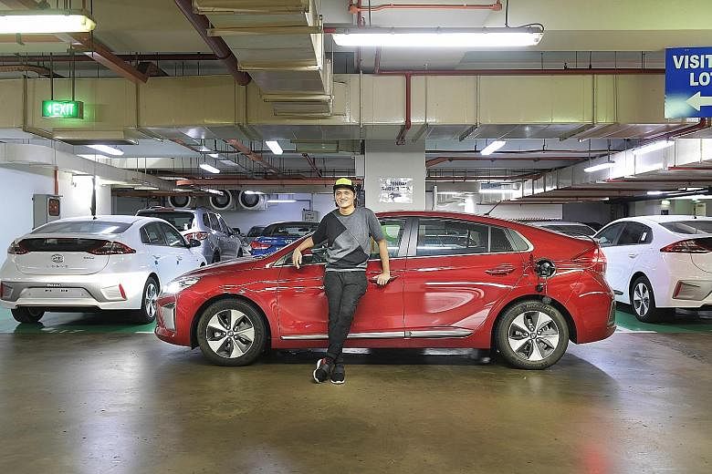 Mr Peter Huang charges the Ioniq Electric at Hyundai's local agent Komoco Motors and The Heeren in Orchard Road.