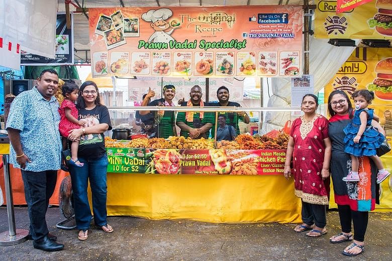Mr Suriyah Selvarajah's family at their Original Recipe vadai stall, which offers cheese and chocolate variations.