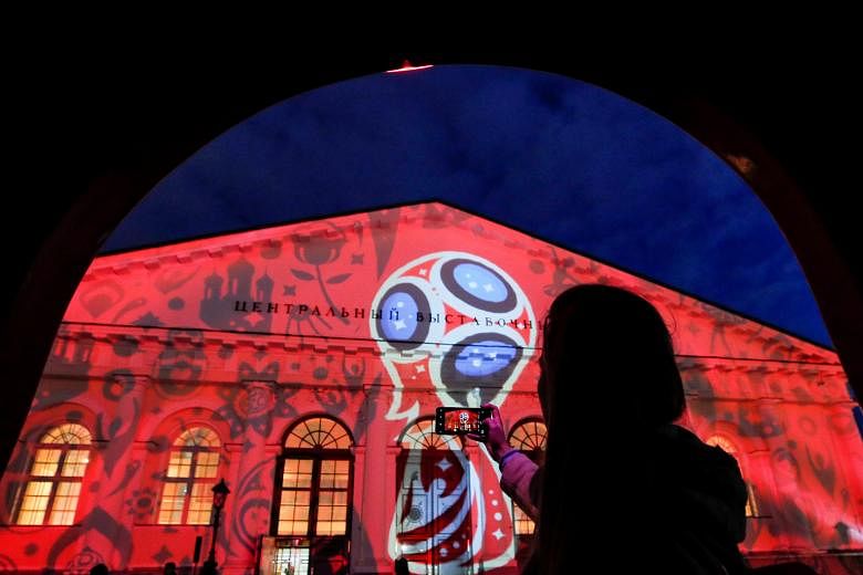 A preview of a World Cup laser show in Moscow. Singtel's Cast app provides full coverage of the Finals on mobile devices.