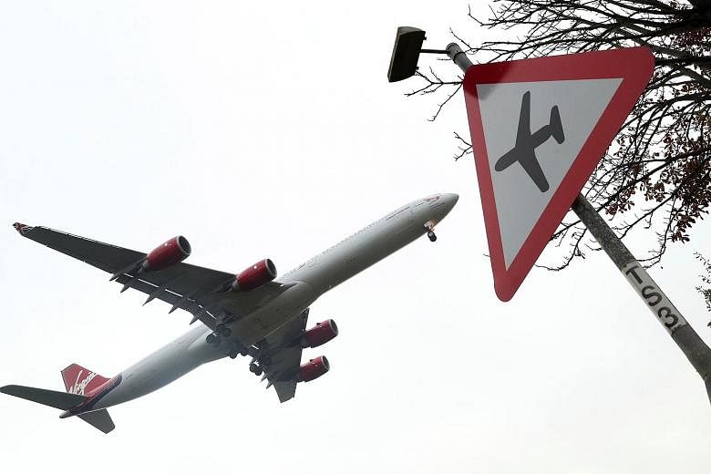 An aircraft preparing to land at London's Heathrow Airport.