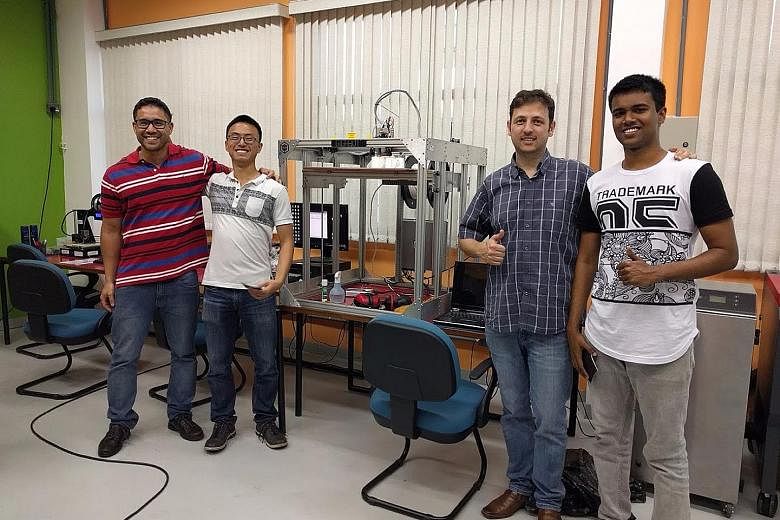Mr Mohsin Ahamed (right) with his colleagues at the Sao Paulo laboratory where he did a three-month internship.