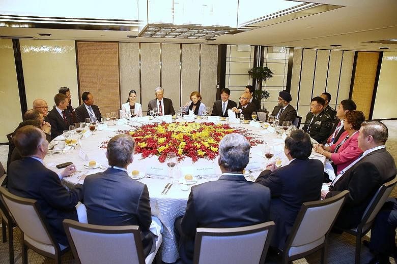 Defence Minister Ng Eng Hen (centre), flanked by Romania's Vice-Prime Minister Ana Birchall (left) and France's Defence Minister Florence Parly, at the second Ministerial Roundtable at the Shangri-La Dialogue yesterday.