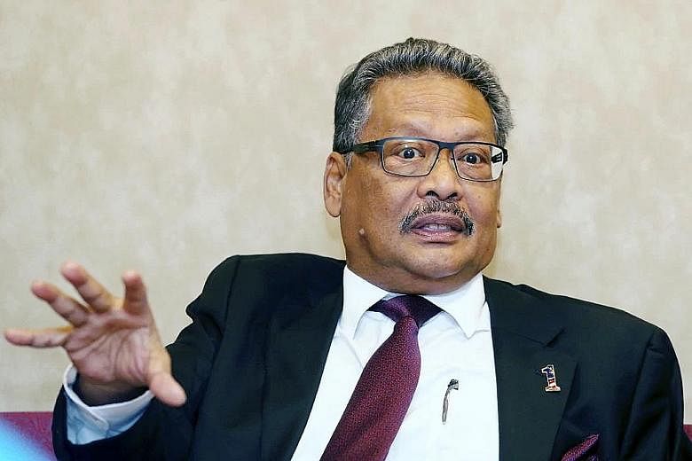 The selection of constitutional lawyer Tommy Thomas (top), a non-Malay, has not gone down well with the King. Current Attorney-General Mohamed Apandi Ali (above) has been put on garden leave.