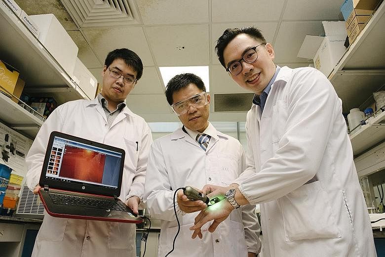 Members of the team involved in the nanoparticle technology research include (from left) research fellows Christian Wiraja and David Yeo (principal investigator) as well as Assistant Professor Xu Chenjie.