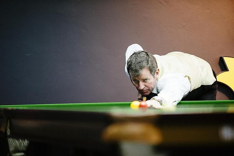 Singapore's billiards star Peter Gilchrist staying focused despite trailing Britain's Robert Hall in the final of the Asian Grand Prix yesterday. He overturned a 3-1 deficit to win 6-4.