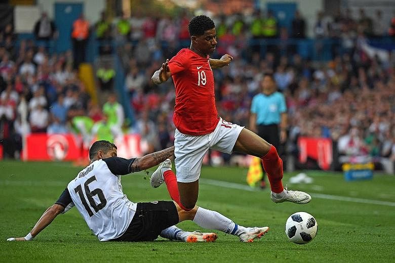 Marcus Rashford hurdling over Costa Rica's Cristian Gamboa in England's 2-0 win. Rashford is one of Gareth Southgate's five forwards and offers the England boss a different option to main striker Harry Kane.