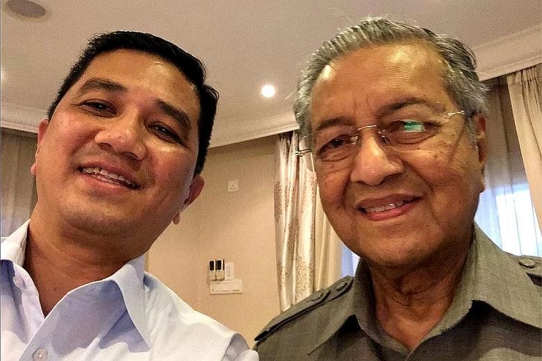 PKR deputy president Azmin Ali (left) with Prime Minister Mahathir Mohamad. As Economic Affairs Minister, Datuk Seri Azmin will oversee Malaysia's biggest firms, including Petronas and Khazanah, say sources.