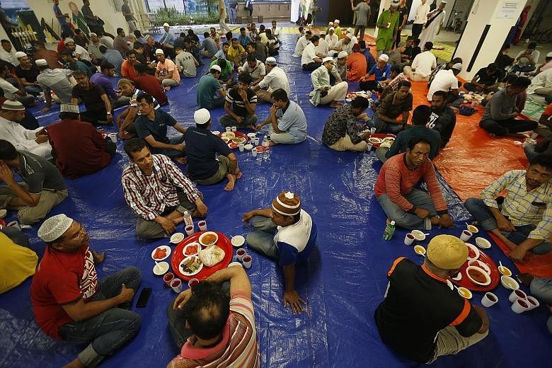 Though more than 200 migrant workers break their fast at the Yusof Ishak mosque every day, yesterday marked the first time workers were formally invited to the mosque in Woodlands. Invitations were sent out to them in Bengali, Tamil and Hindi. The ev