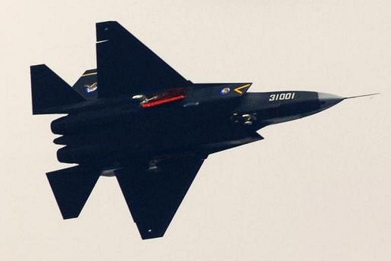 China's Shenyang J-31 stealth fighter (left) in a test flight. An F-35 stealth fighter (right) in action. Reports prepared for the Pentagon say that over the years, the Chinese have stolen designs for the F-35 joint strike fighter and the advanced Pa