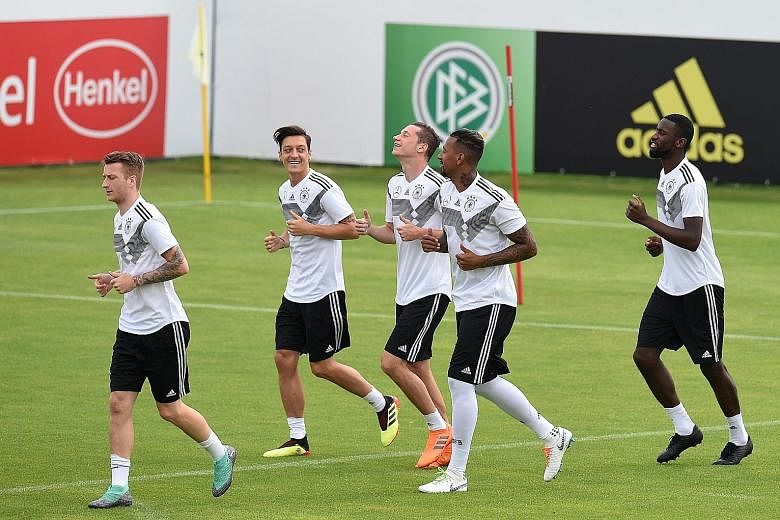 Players from the German team training ahead of the 2018 Fifa World Cup in Russia. Fifa has earmarked US$134 million for insurance for clubs whose players get injured in this year's event.