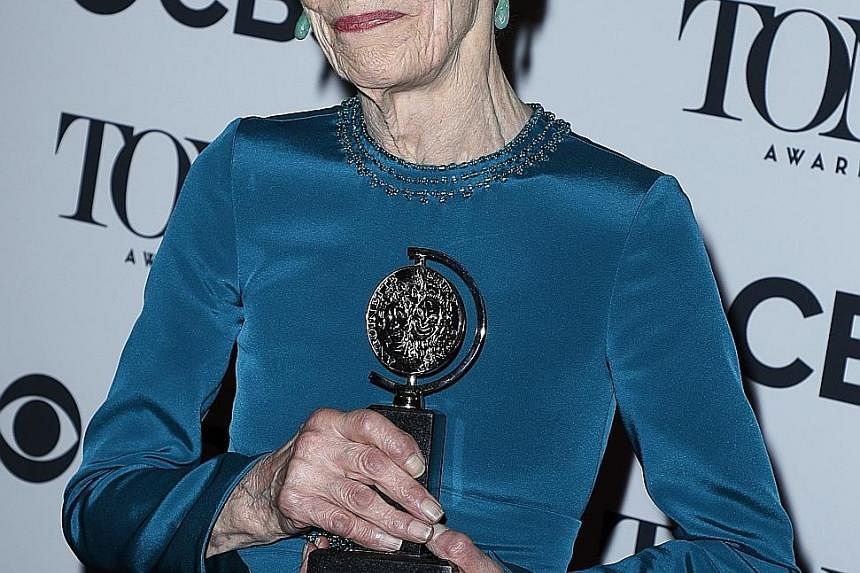 Andrew Garfield wins best actor in a play for Angels In America; and (Above) British actress Glenda Jackson was named best actress in a play for Three Tall Women.