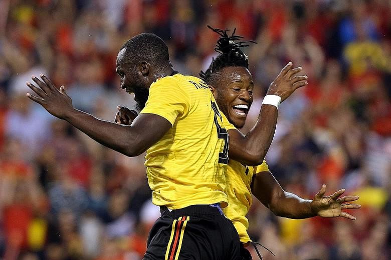 Belgium's Michy Batshuayi (right) celebrates scoring their fourth goal with Romelu Lukaku, who earlier scored a brace himself. The Belgian attack flourished in a 4-1 friendly win over Costa Rica.
