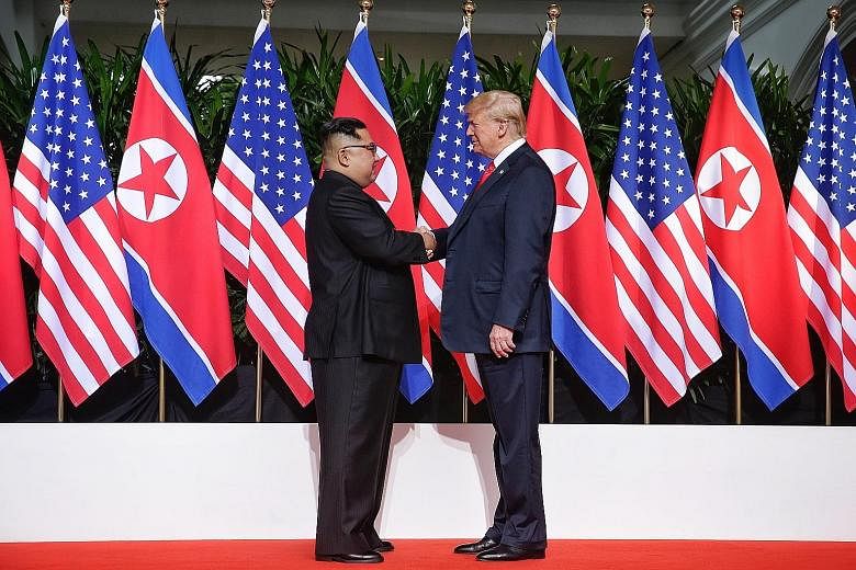 North Korean leader Kim Jong Un and US President Donald Trump meeting at the Capella hotel on Sentosa yesterday, in a moment described as "historic" and "epochal" by the joint statement both leaders signed later on.