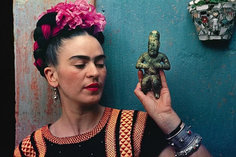 (Top) Frida Kahlo with Olmec figurine, 1939. (Above) Necklace made by Matilde Poulat, Mexico City, circa 1950.
