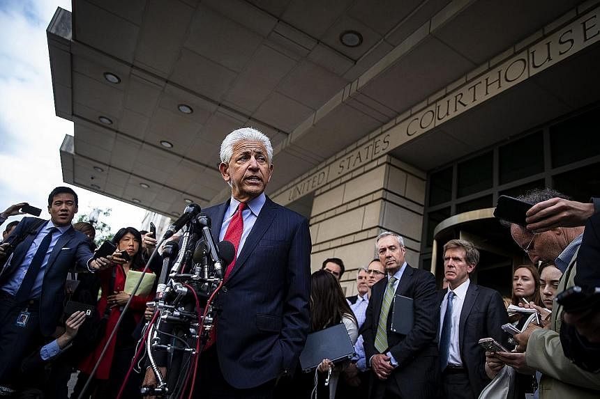 Mr Daniel Petrocelli, lead attorney for AT&T and Time Warner, addressing the media outside court on Tuesday. The ruling in favour of AT&T could prompt a cascade of pay TV companies buying television and movie makers.