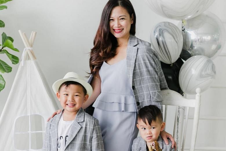 Ms Tjin Lee with sons Tyler, five, and Jake, two. She feels it is common practice for, say, magazines to show just the final, touched-up images.