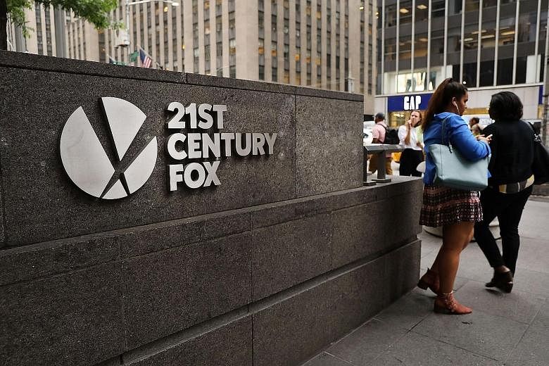 The headquarters of 21st Century Fox in New York City. Comcast's all-cash bid sets up a showdown with the Walt Disney Co for Mr Rupert Murdoch's media empire. There is bad blood between Disney and Comcast, stretching back to at least 2004, when Comca