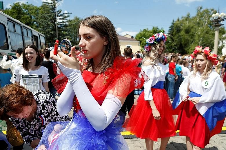 Contestants prepare for a regional preliminary stage of the Miss Russia beauty contest. Russian women have been told by a senior lawmaker to steer away from having sexual relations with foreigners during the month-long World Cup, which is expected to
