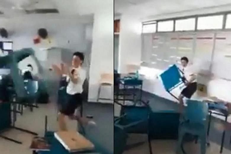 In the viral video, two students can be seen throwing chairs and desks across the classroom and at each other as others try to leave.