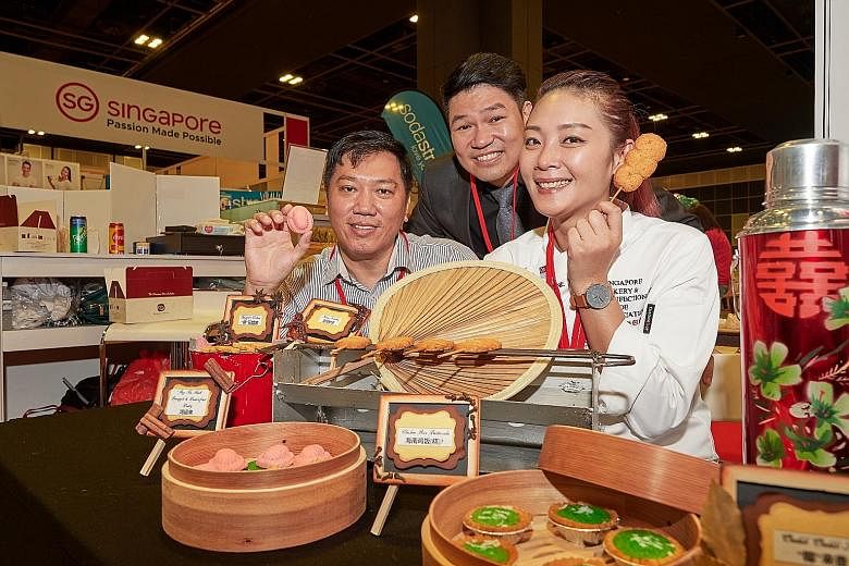 Showpieces by competitors from Singapore (right) and Taiwan (second from right) created for the International Bake-A-Star championship. Local talents will battle it out in the Singapore Bake-A-Star championship today and tomorrow. The team behind Ms 