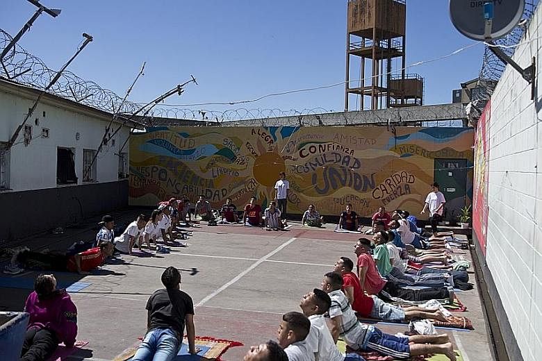 Moksha volunteers teaching yoga to inmates of the San Martin state prison. Currently, 20 instructors volunteer for the Moksha project, which has been organising yoga lessons since 2015 in two units of the prison in Buenos Aires.