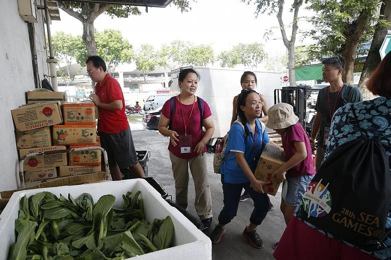 SG Food Rescue volunteers scour the Pasir Panjang Wholesale Centre to collect food items - mostly fruits and vegetables - that are edible but not considered good enough to sell because they are slightly blemished, discoloured or odd-shaped. The food 