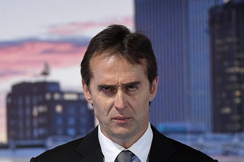 New Real Madrid coach Julen Lopetegui with tears welling up in his eyes while speaking at the Santiago Bernabeu on Thursday.